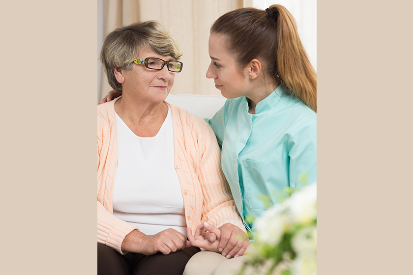   Remove BG  Save  Share  Sample  Elderly female sitting beside nurse 